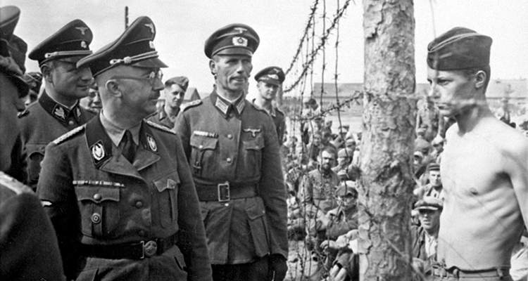 Nazi commander Heinrich Himmler inspects a concentration camp.